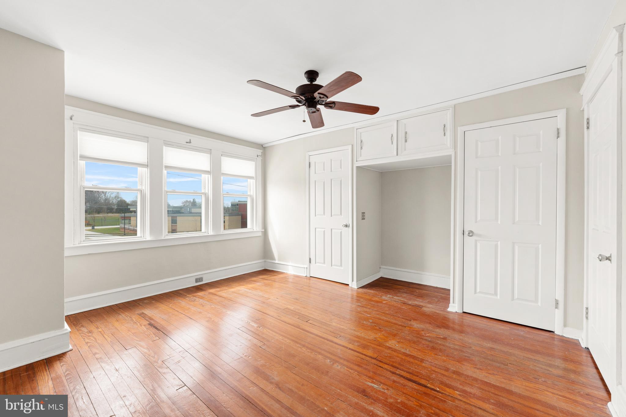 1441 Lawrence Road Havertown, PA 19083 - Photo 9 of 13 wooden floor in an empty room with a window