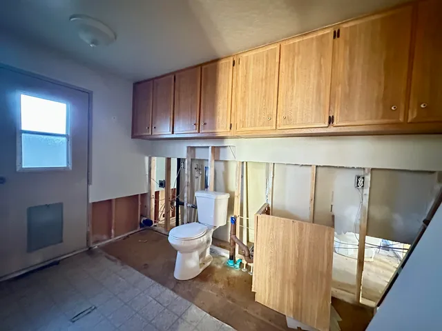 a bathroom with a double vanity sink