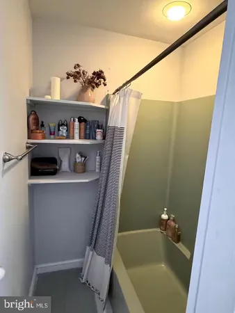 a bathroom with a bathtub