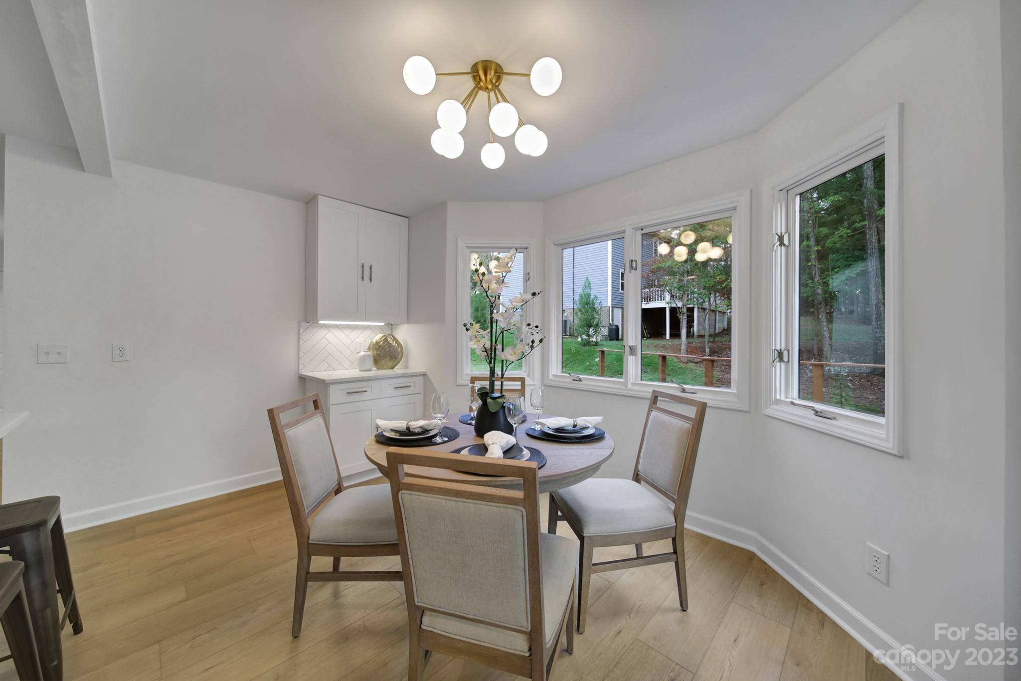 25068 Timberlake Drive Tega Cay, SC 29708 - Photo 17 of 48 a dining room with furniture and window
