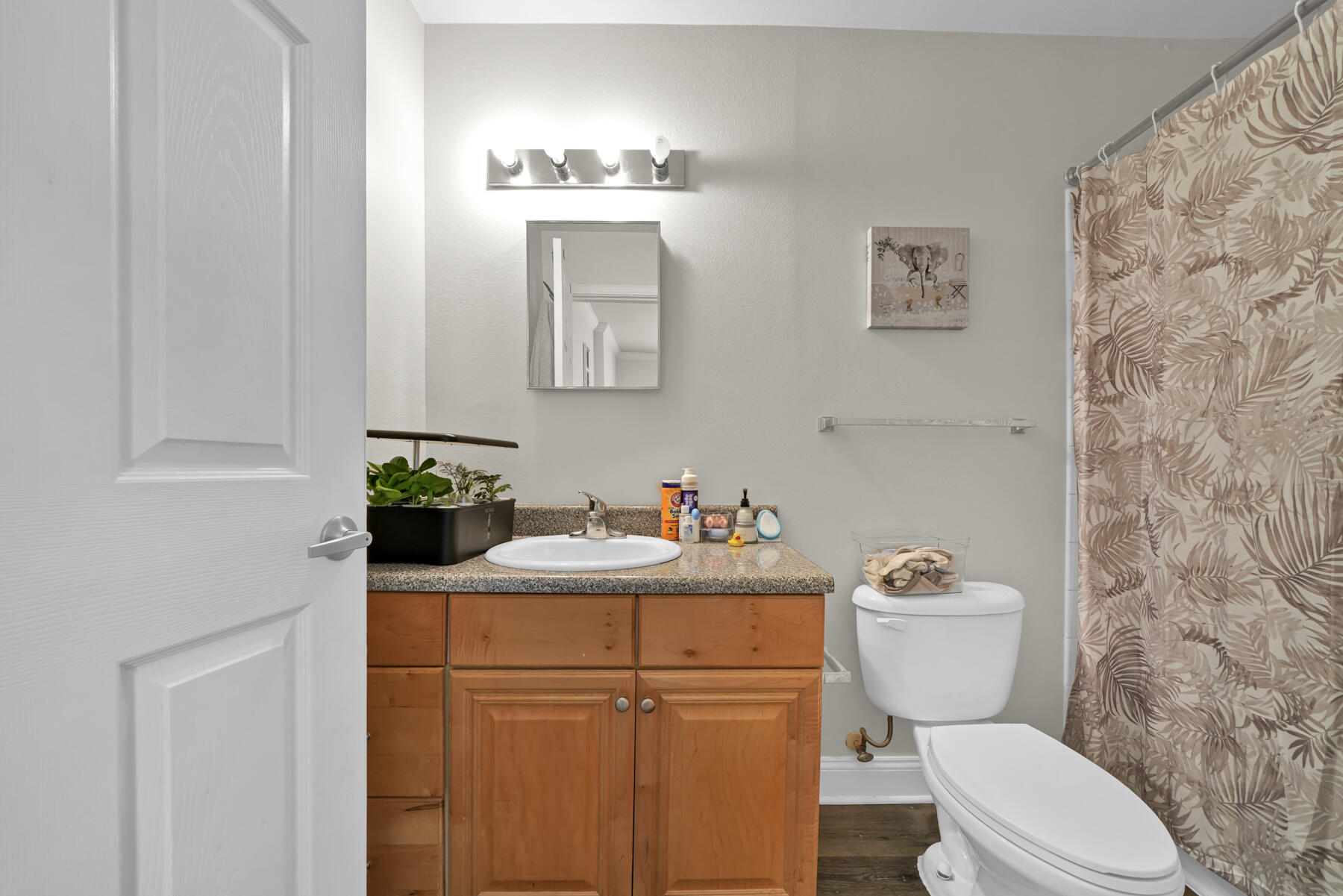 562 Wingspan Way Crestview, FL 32536 - Photo 13 of 23 a bathroom with a sink a toilet and mirror
