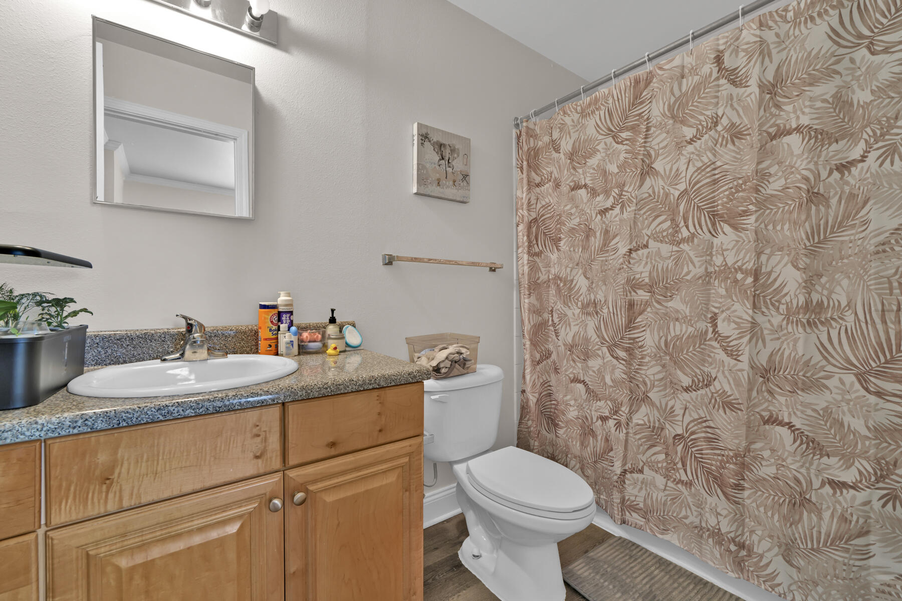 562 Wingspan Way Crestview, FL 32536 - Photo 14 of 23 a bathroom with a granite countertop sink and a toilet
