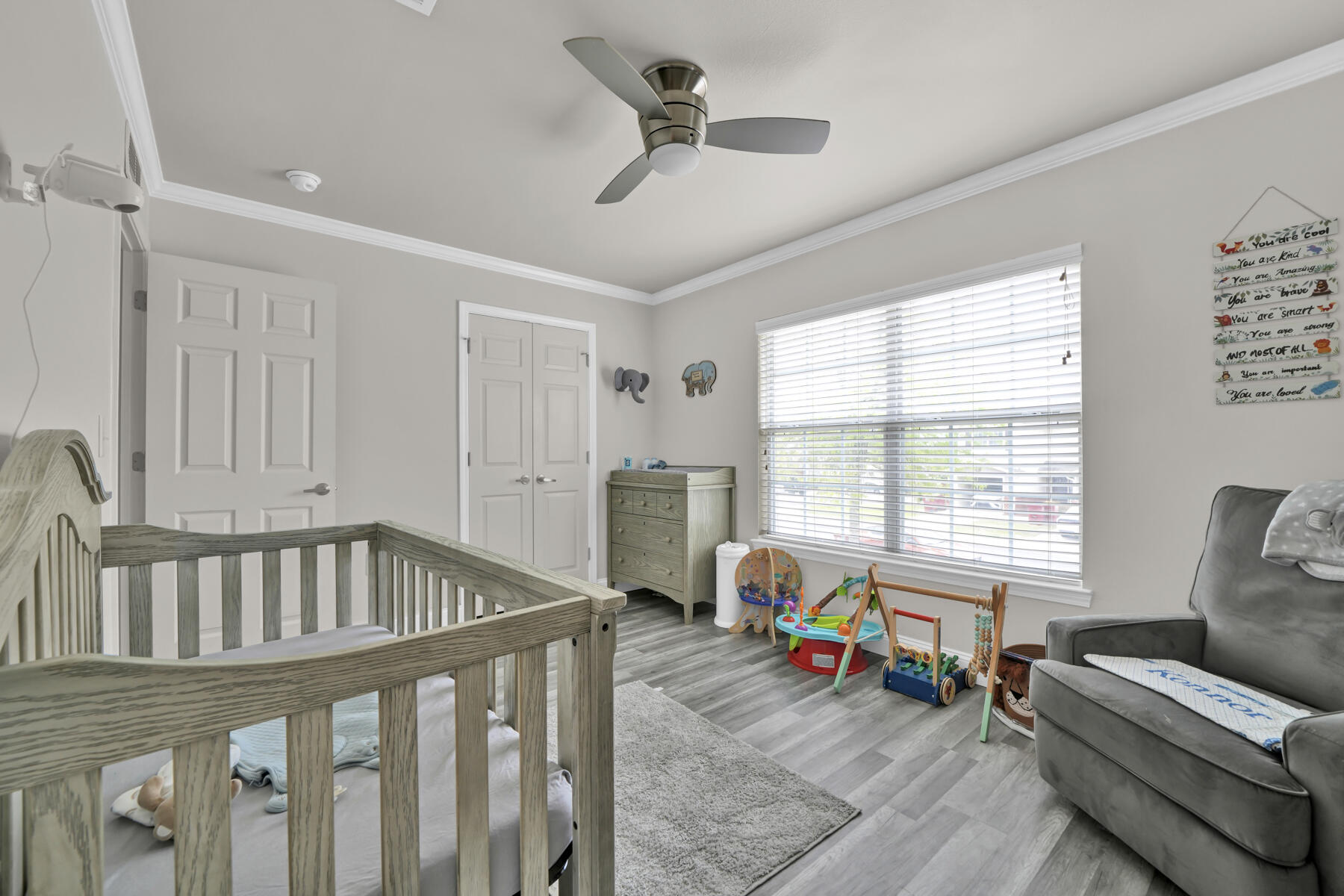 562 Wingspan Way Crestview, FL 32536 - Photo 15 of 23 a living room with furniture and a large window
