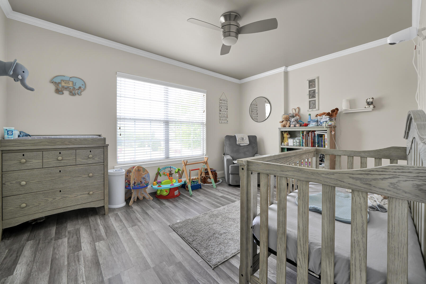 562 Wingspan Way Crestview, FL 32536 - Photo 17 of 23 a bedroom with furniture and a large window
