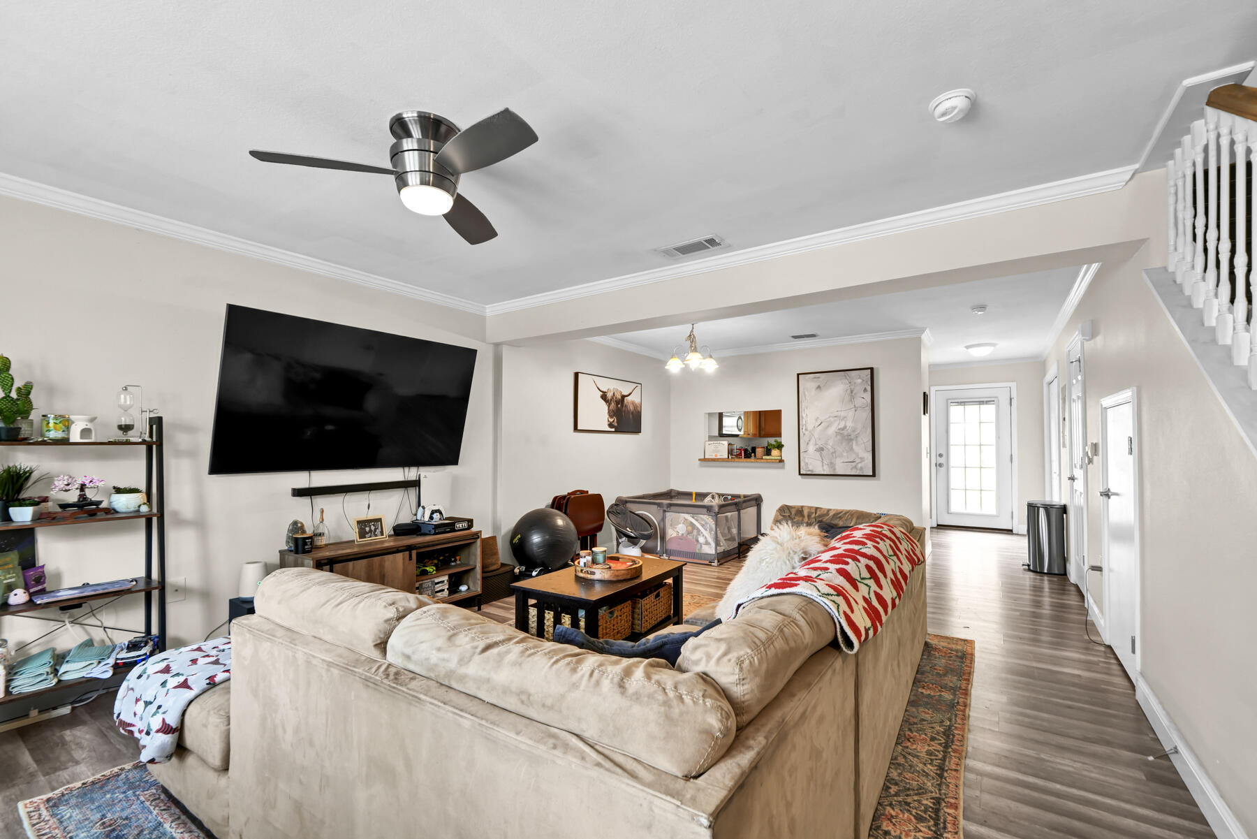 562 Wingspan Way Crestview, FL 32536 - Photo 4 of 23 a living room with furniture and a flat screen tv