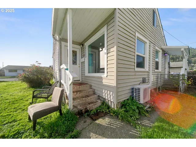 a view of a house with a garden