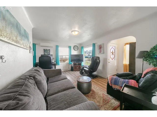 a living room with furniture and a couch