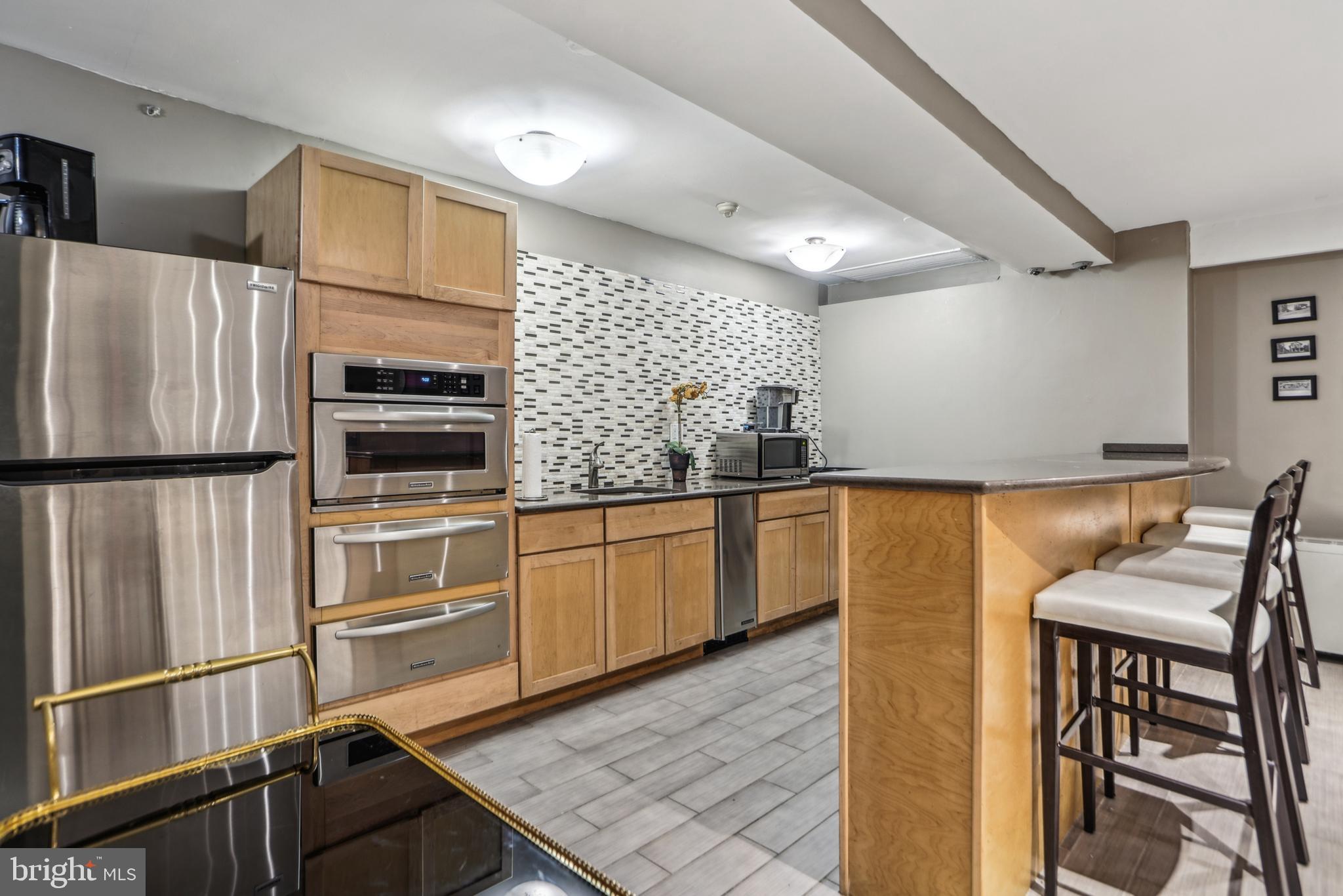 1900 Lyttonsville Road, Unit 1204 Silver Spring, MD 20910 - Photo 24 of 30 Party Room Kitchen