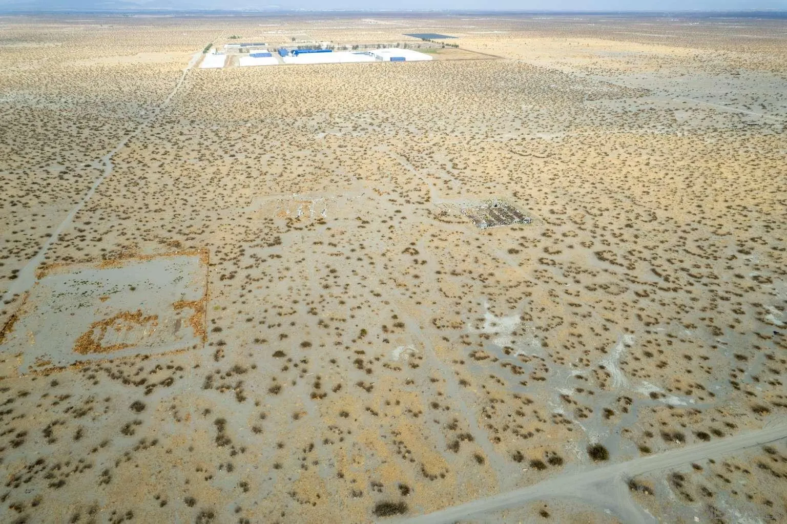 0 Keats Road, Unit 10 Adelanto, CA 92301 - Photo 5 of 39 a bathroom with a shower curtain