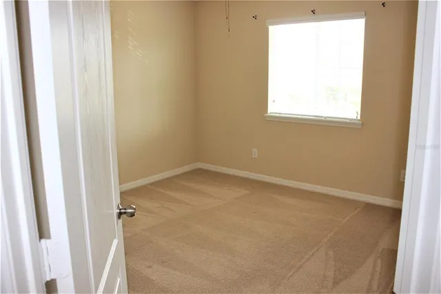 an empty room with a window