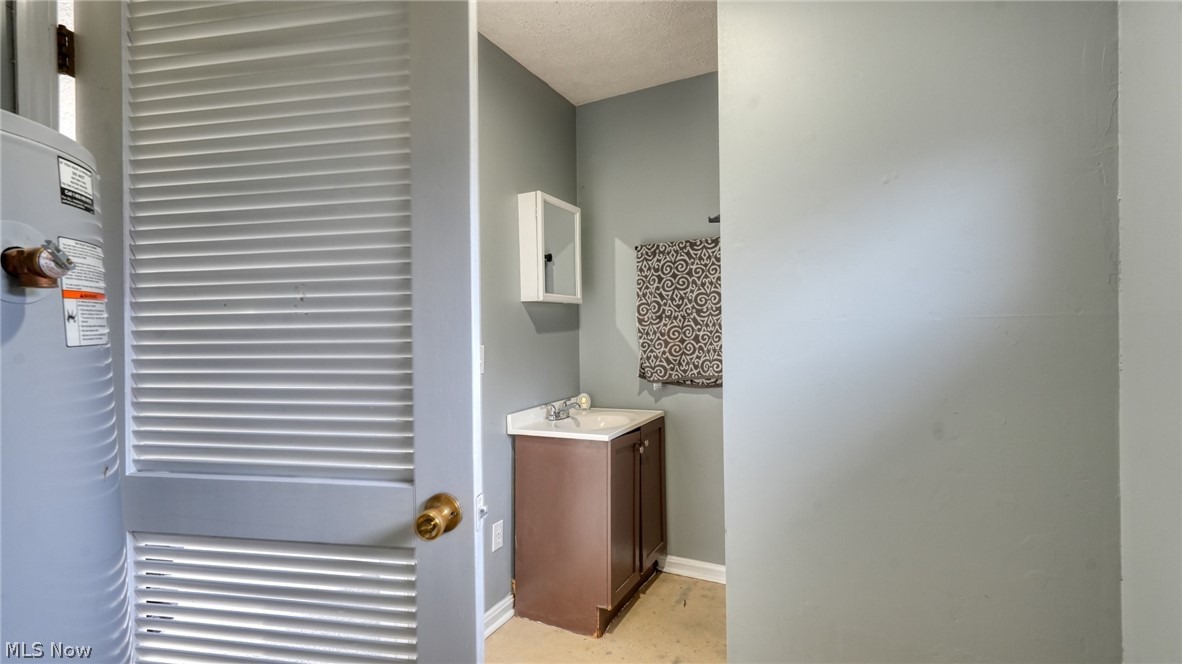 10386 Pioneer Road Byesville, OH 43723 - Photo 16 of 24 Master bath & Laundry