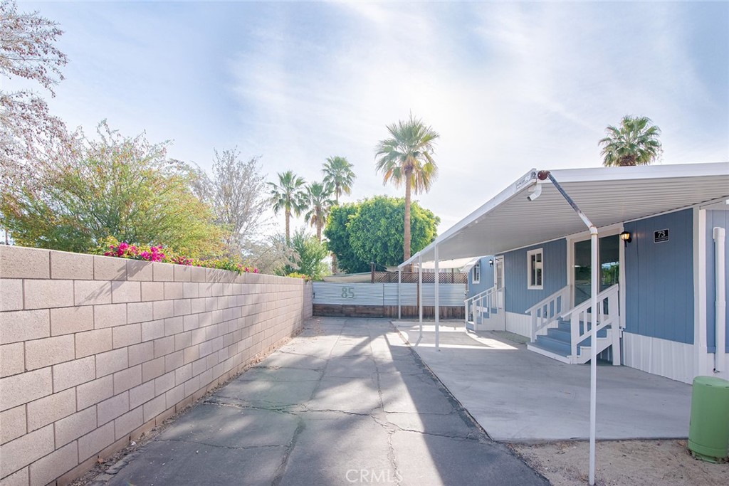 73 Alesandro Road, Unit A Palm Springs, CA 92264 - Photo 5 of 23 a view of a tables and chairs in patio