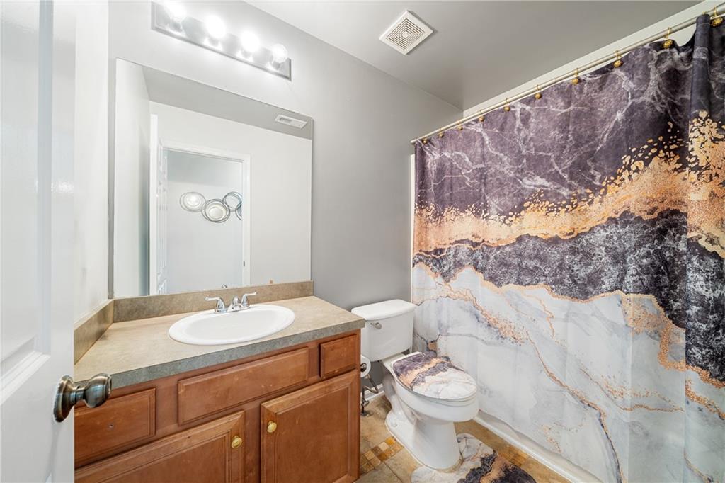 55 Meridian Point Dallas, GA 30132 - Photo 24 of 45 a bathroom with a sink and a mirror