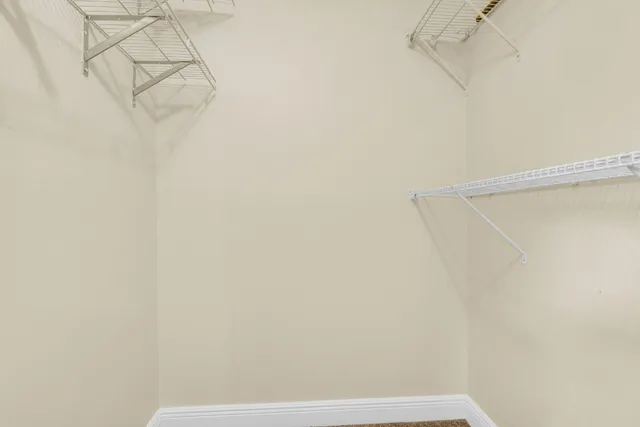 a view of small space with racks on the wall