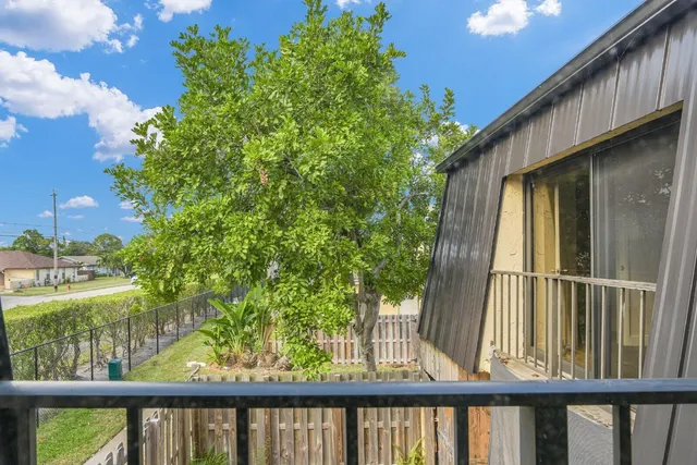 a view of a balcony with an outdoor space