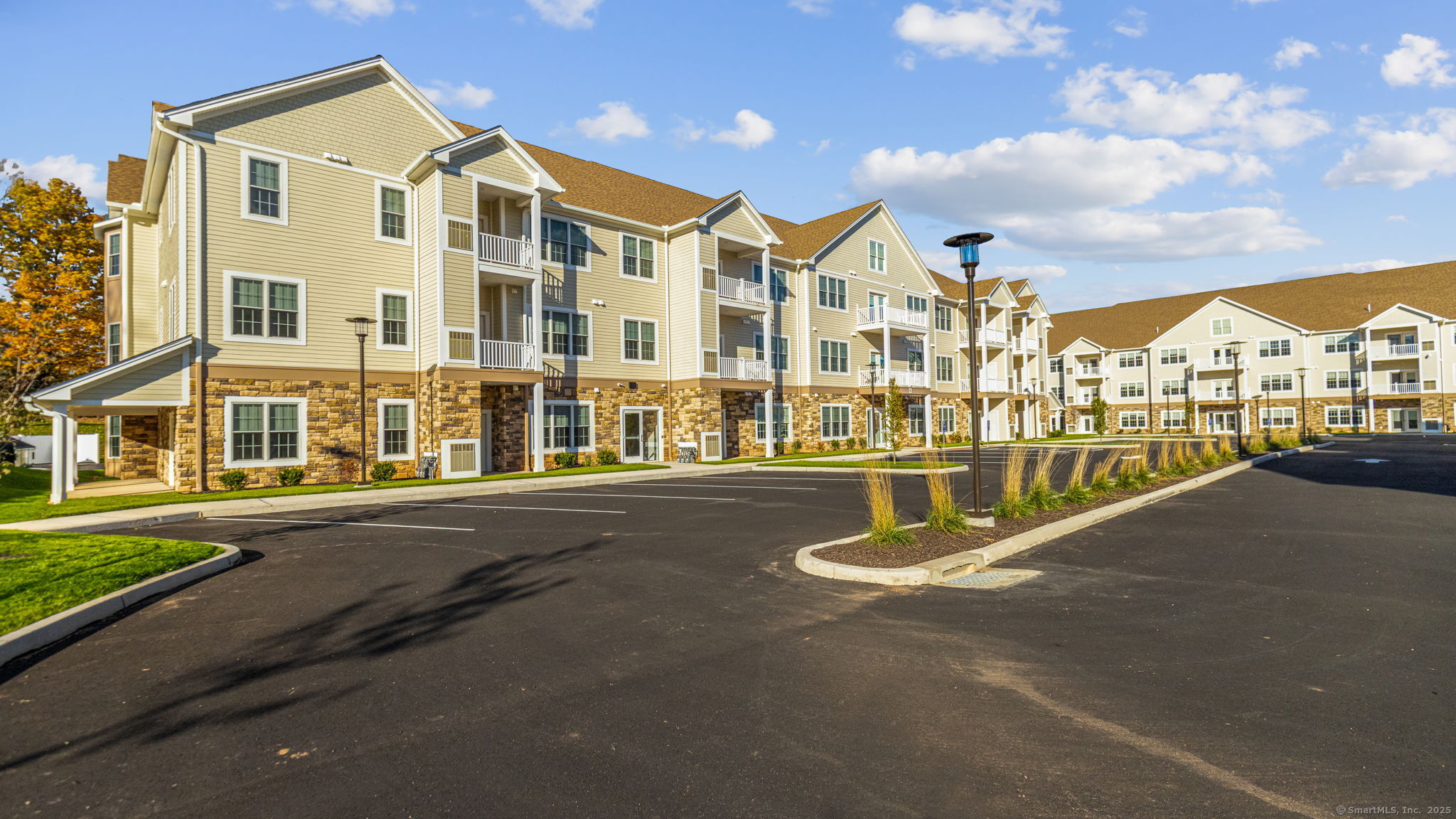 104 Episcopal Road, Unit 1 Berlin, CT 06037 - Photo 17 of 27 a view of tall building with a street