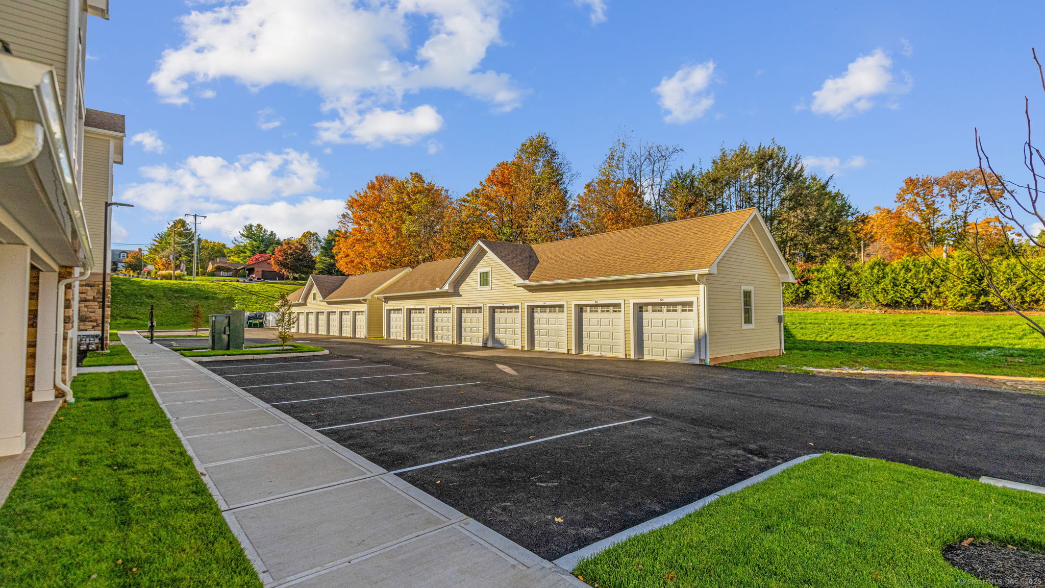 104 Episcopal Road, Unit 1 Berlin, CT 06037 - Photo 18 of 27 a view of a house with a yard