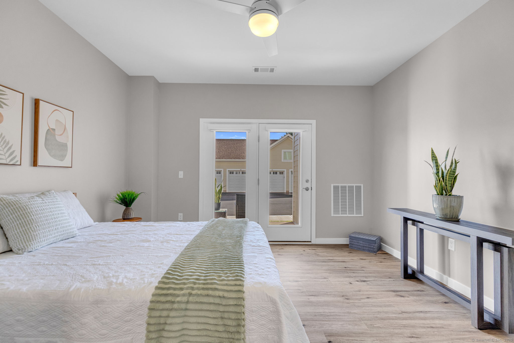 104 Episcopal Road, Unit 1 Berlin, CT 06037 - Photo 23 of 27 a bedroom with a bed and a window