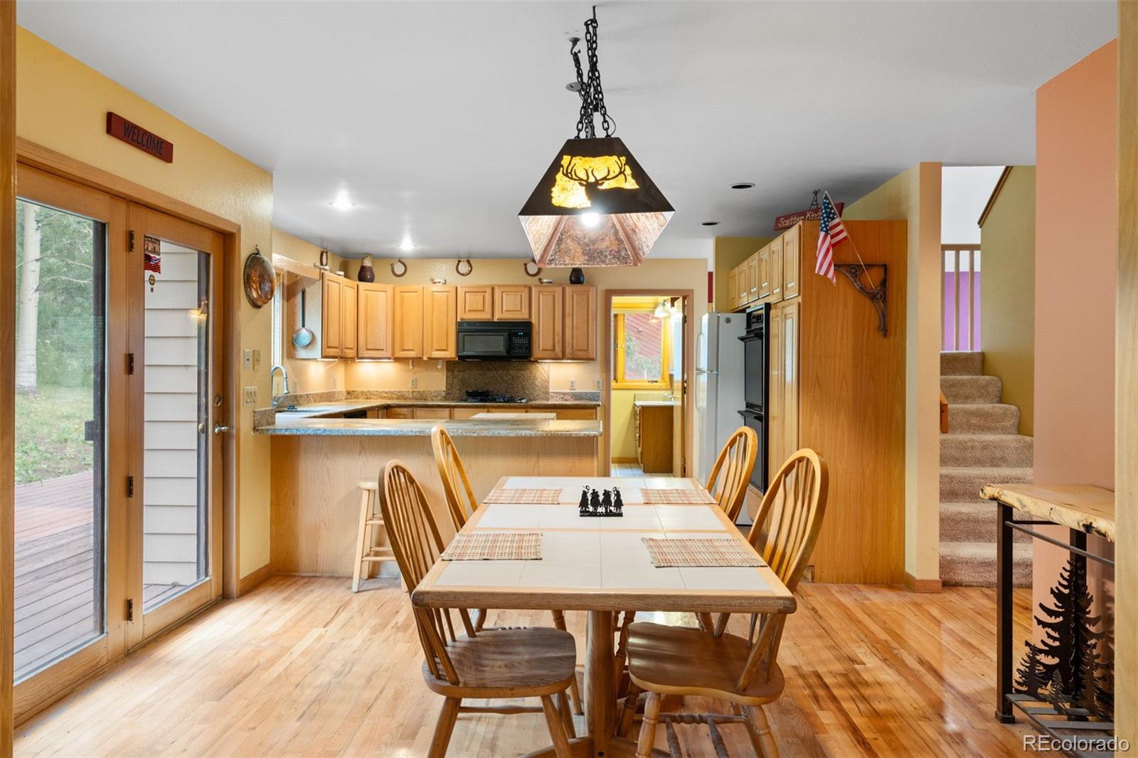 868 Deer Path Road Dillon, CO 80435 - Photo 26 of 50 a view of a dining room with furniture window and outside view