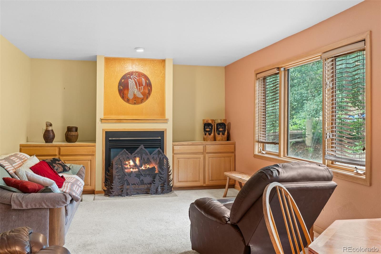 868 Deer Path Road Dillon, CO 80435 - Photo 30 of 50 a living room with furniture and a fireplace