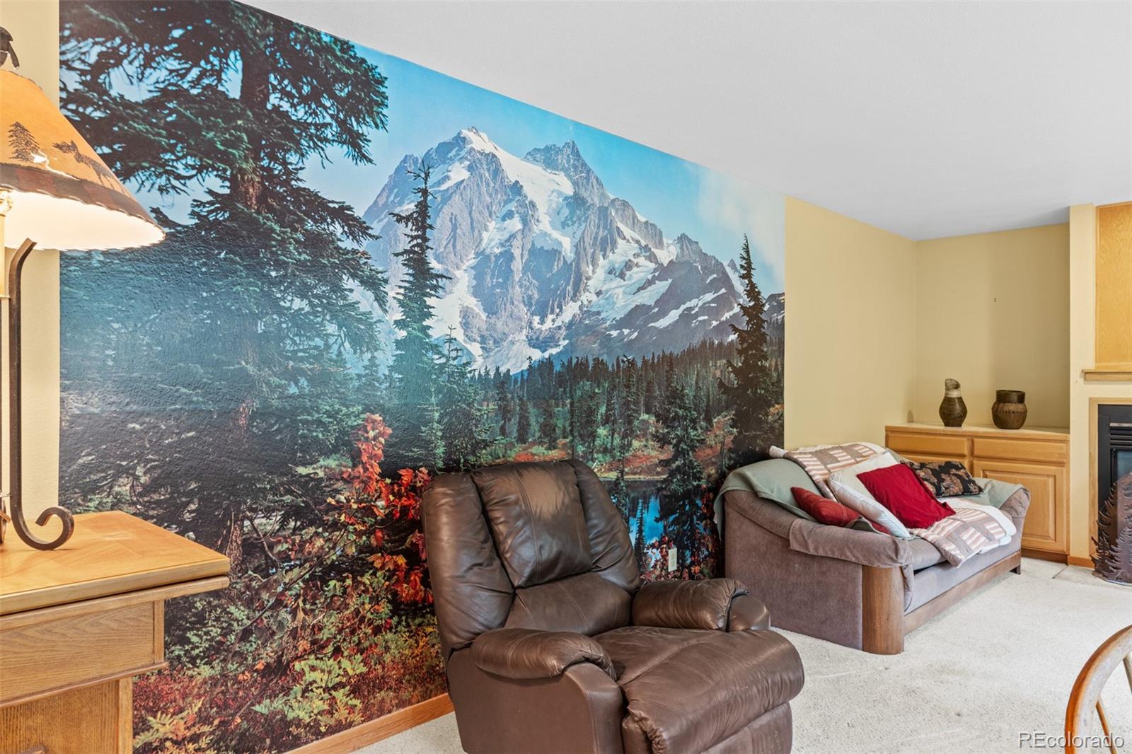 868 Deer Path Road Dillon, CO 80435 - Photo 32 of 50 a living room with furniture and a chandelier