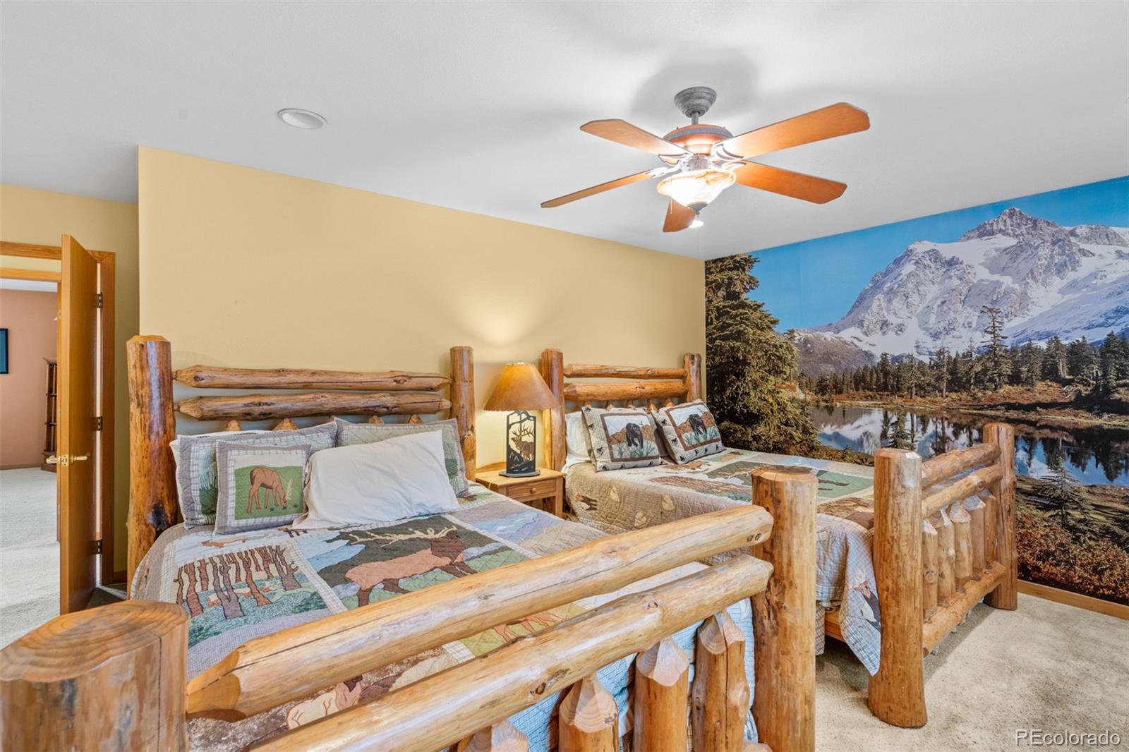 868 Deer Path Road Dillon, CO 80435 - Photo 44 of 50 a view of a dining room with furniture window and wooden floor