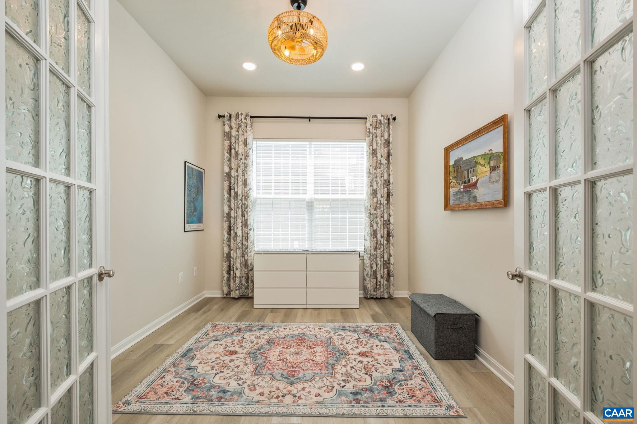 124 Stodghill Drive Ruckersville, VA 22968 - Photo 11 of 58 a view of entryway with a rug and wooden floor