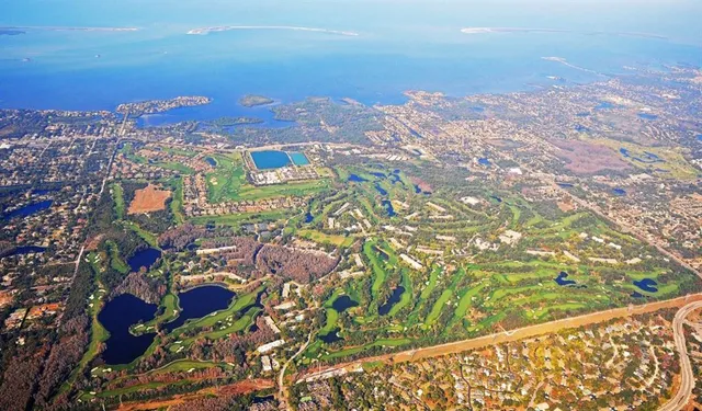 a terrace with outdoor seating and city view