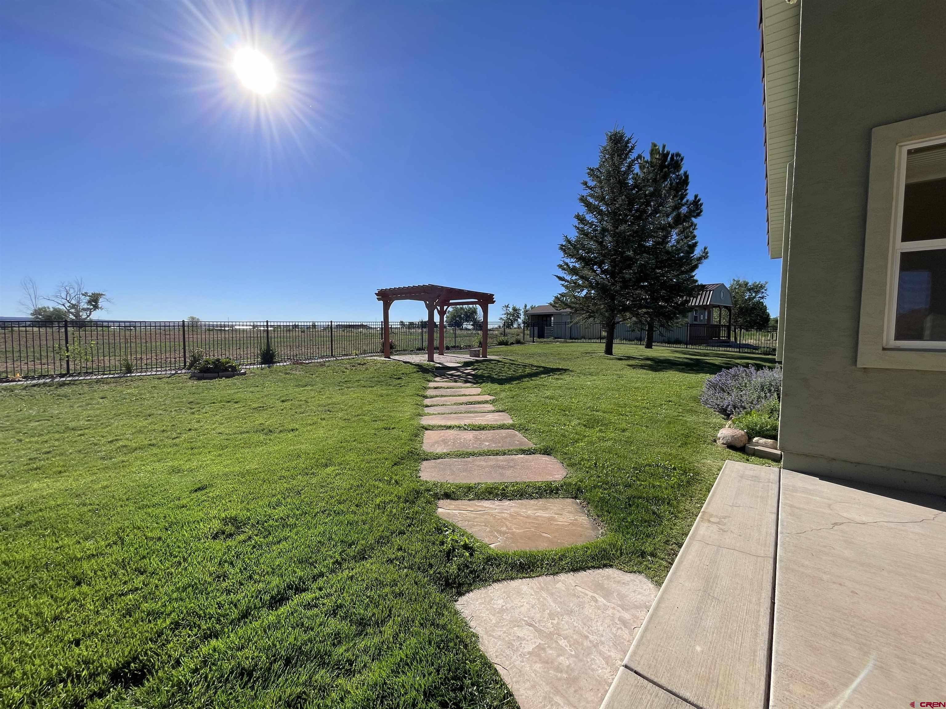 12863 24.4 Road Cortez, CO 81321 - Photo 26 of 35 swimming pool with yard in front of it