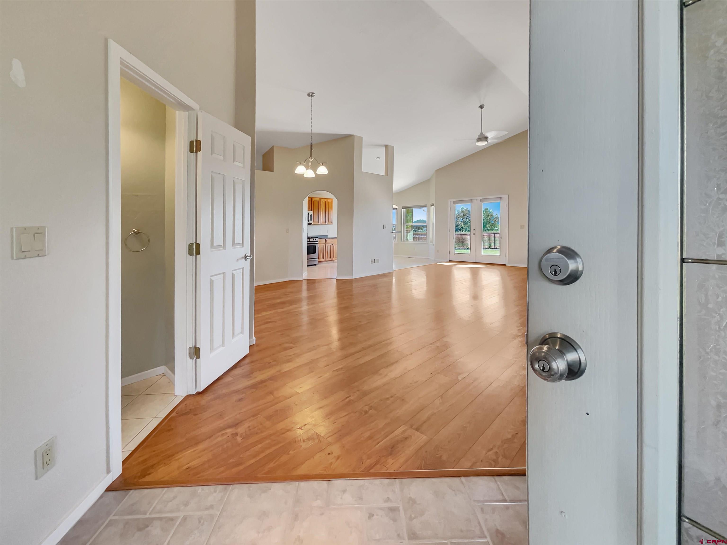 12863 24.4 Road Cortez, CO 81321 - Photo 4 of 35 a view of a hallway with wooden floor