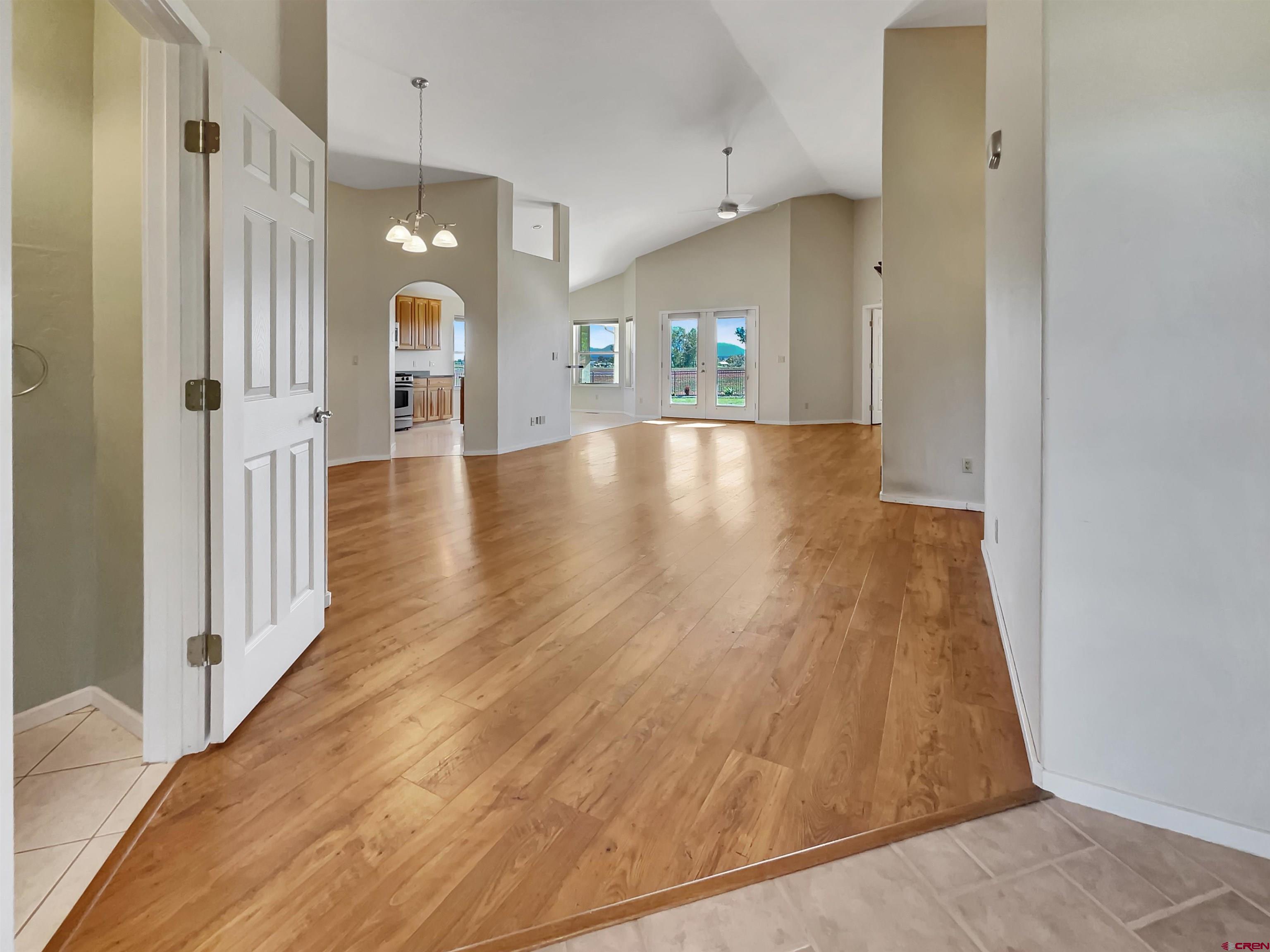 12863 24.4 Road Cortez, CO 81321 - Photo 5 of 35 a view of a hallway with wooden floor