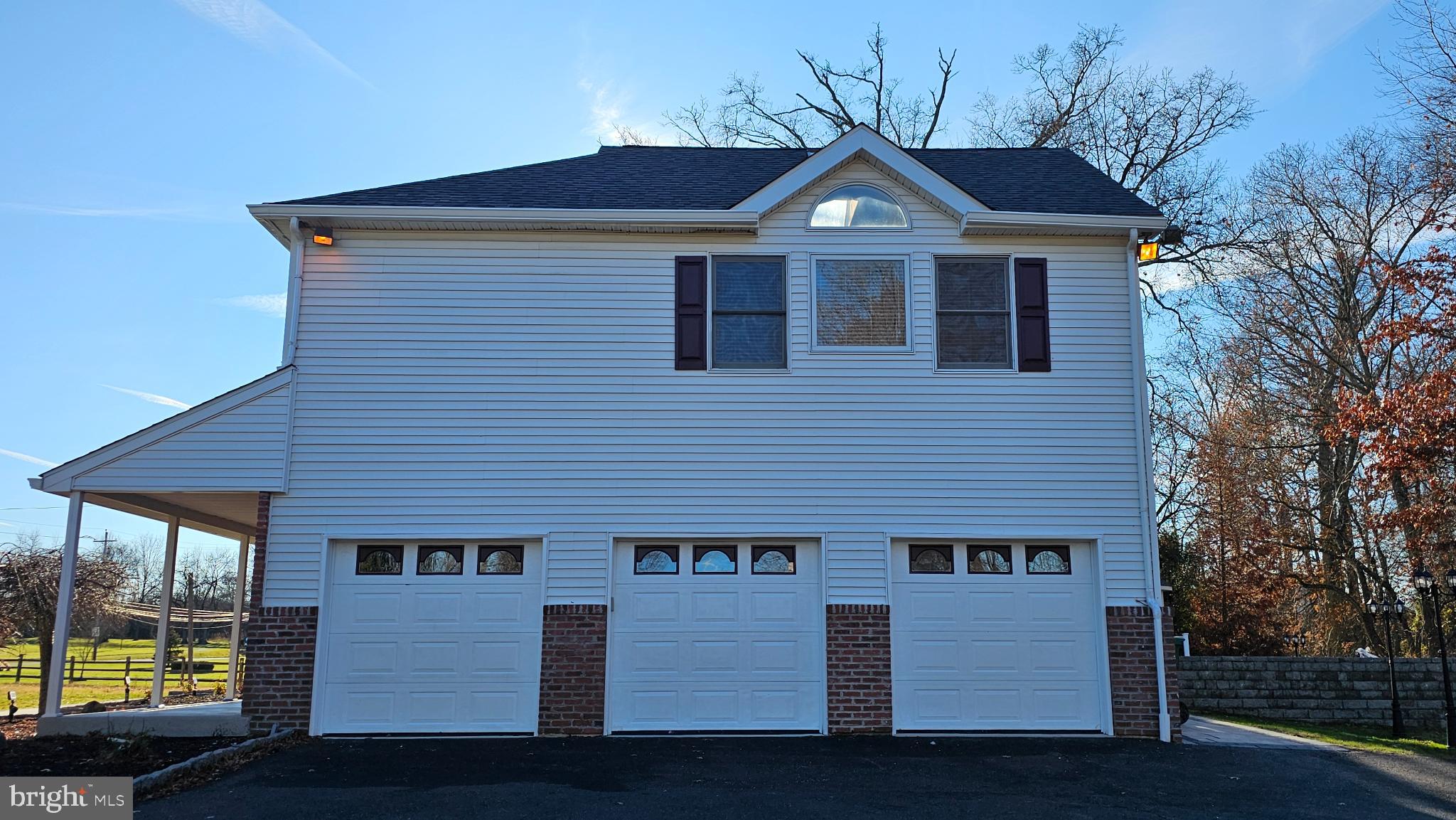 1217 McKean Road Ambler, PA 19002 - Photo 15 of 63 a front view of a house with a yard