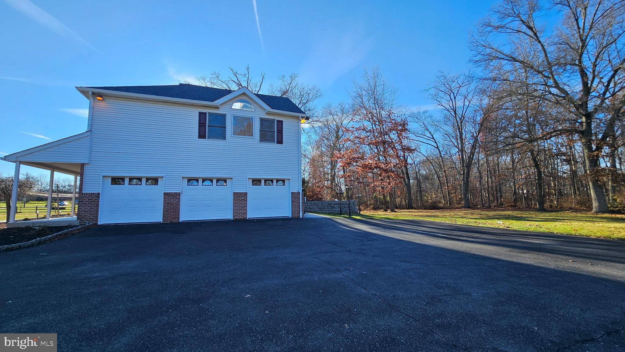 1217 McKean Road Ambler, PA 19002 - Photo 16 of 63 Charming home with spacious driveway and trees.
