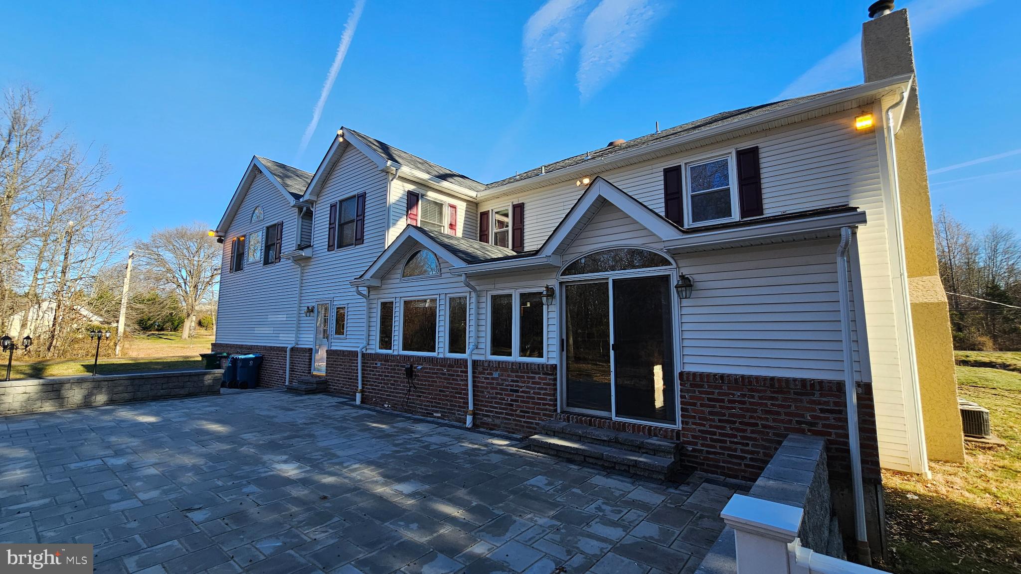 1217 McKean Road Ambler, PA 19002 - Photo 17 of 63 a front view of a house with a yard