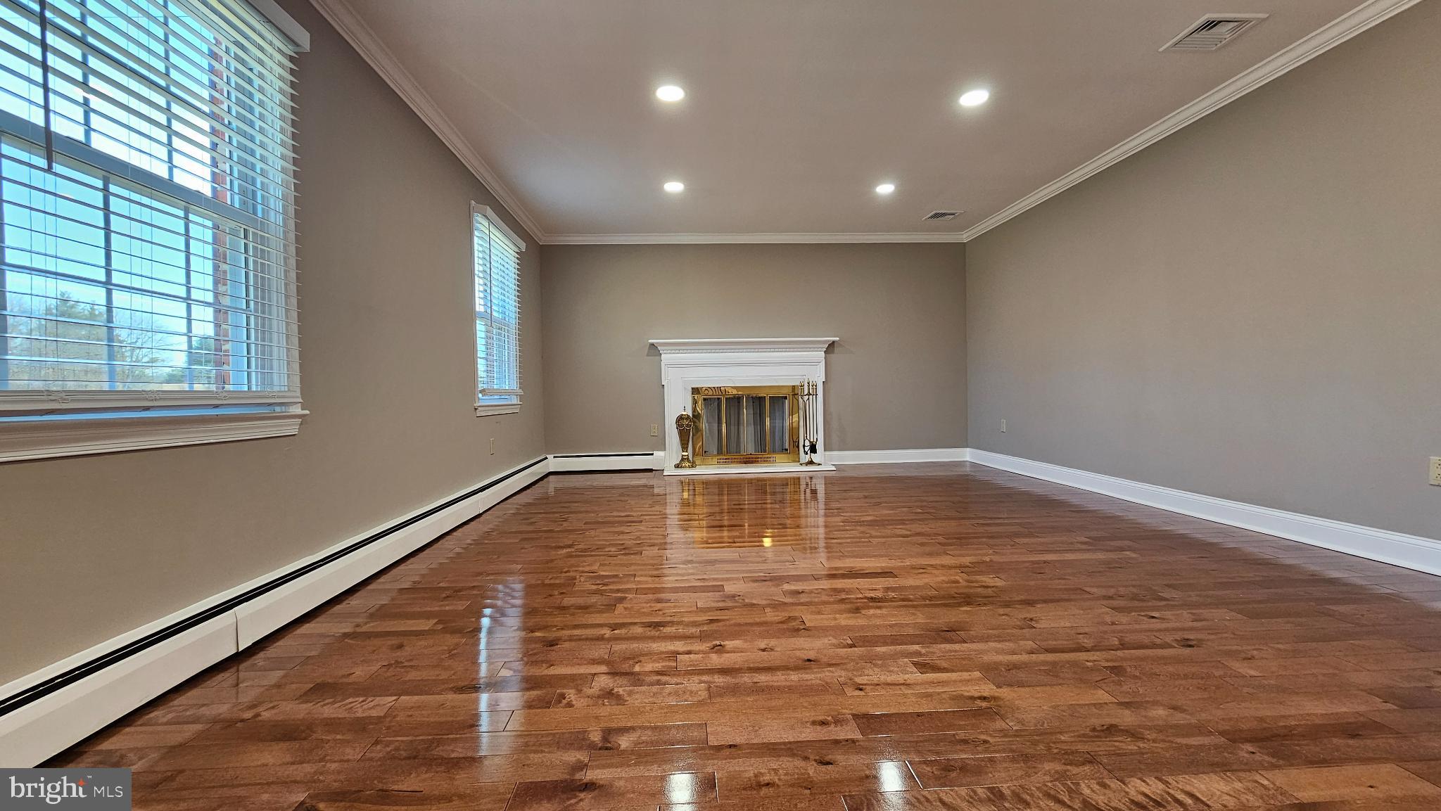 1217 McKean Road Ambler, PA 19002 - Photo 25 of 63 a big room with wooden floor and a window