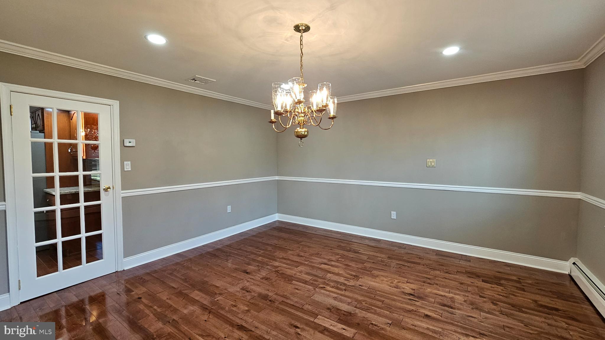 1217 McKean Road Ambler, PA 19002 - Photo 27 of 63 a view of empty room with wooden floor and fan