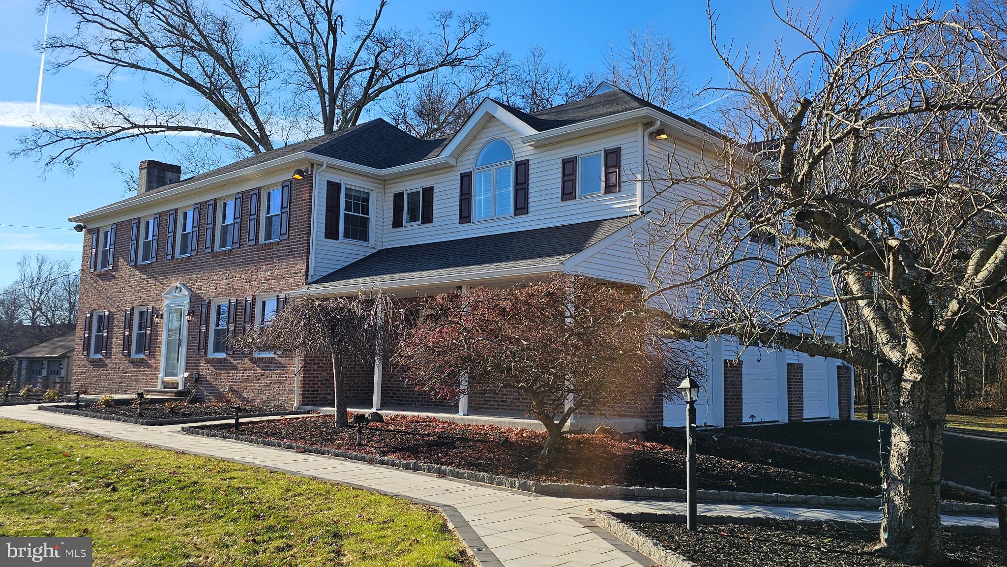 1217 McKean Road Ambler, PA 19002 - Photo 3 of 63 a front view of a house with garden