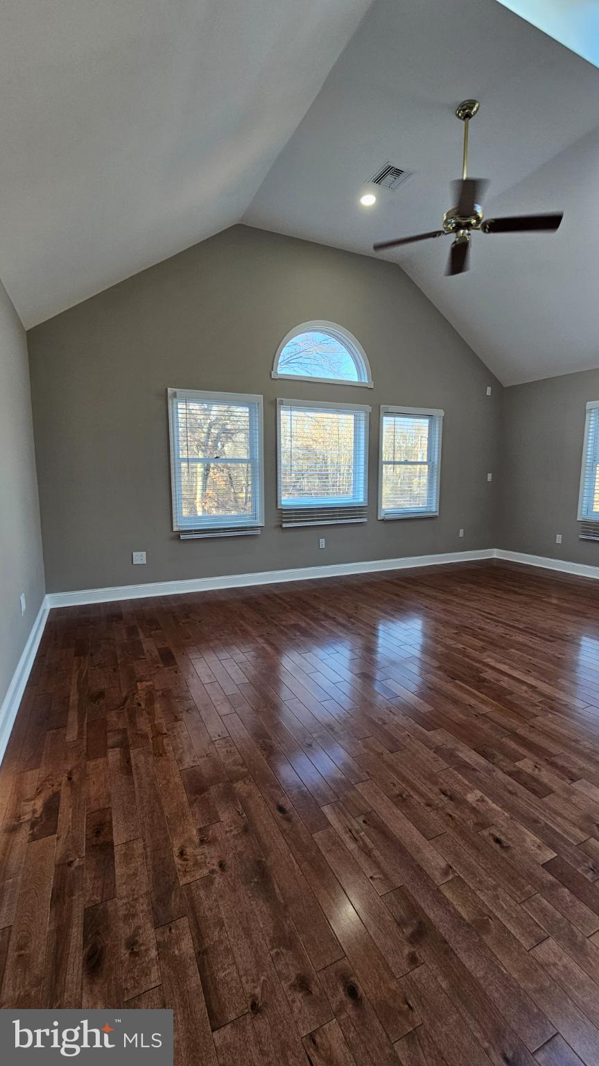 1217 McKean Road Ambler, PA 19002 - Photo 33 of 63 an empty room with wooden floor and windows