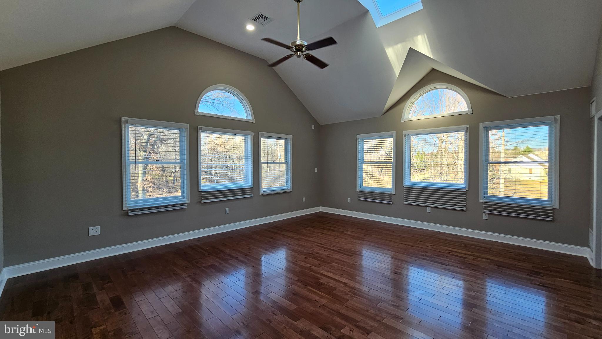 1217 McKean Road Ambler, PA 19002 - Photo 35 of 63 a view of an empty room with wooden floor and a window