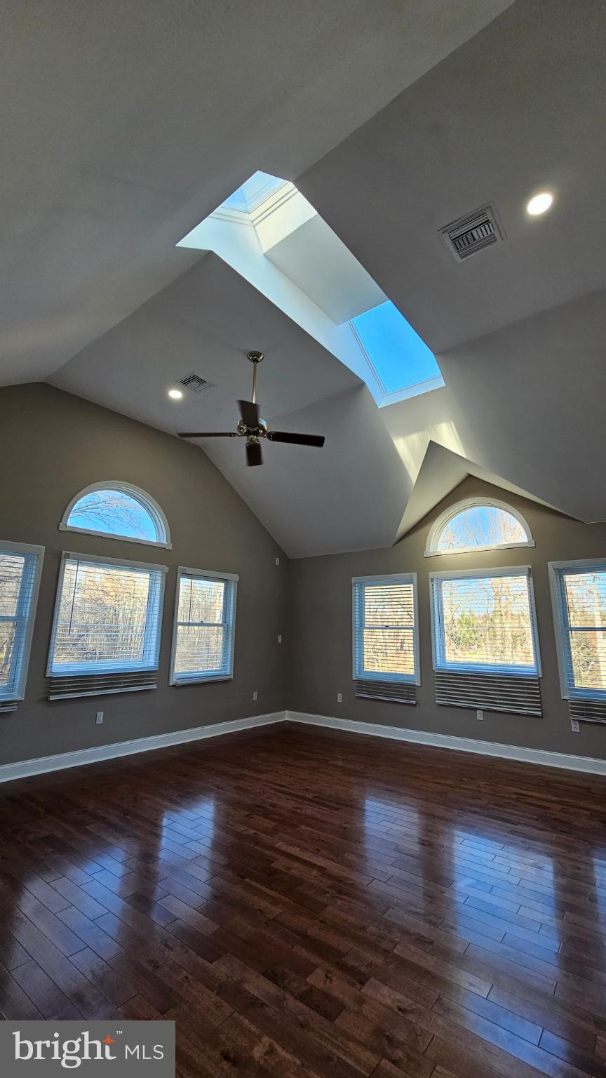 1217 McKean Road Ambler, PA 19002 - Photo 36 of 63 an empty room with wooden floor and windows