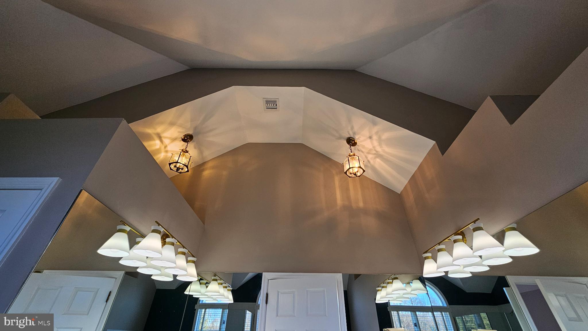 1217 McKean Road Ambler, PA 19002 - Photo 39 of 63 Elegant angles and warm lighting embrace space.