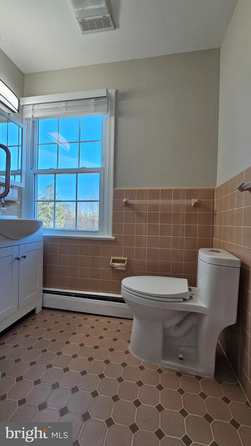 1217 McKean Road Ambler, PA 19002 - Photo 53 of 63 a bathroom with a toilet a sink and a shower