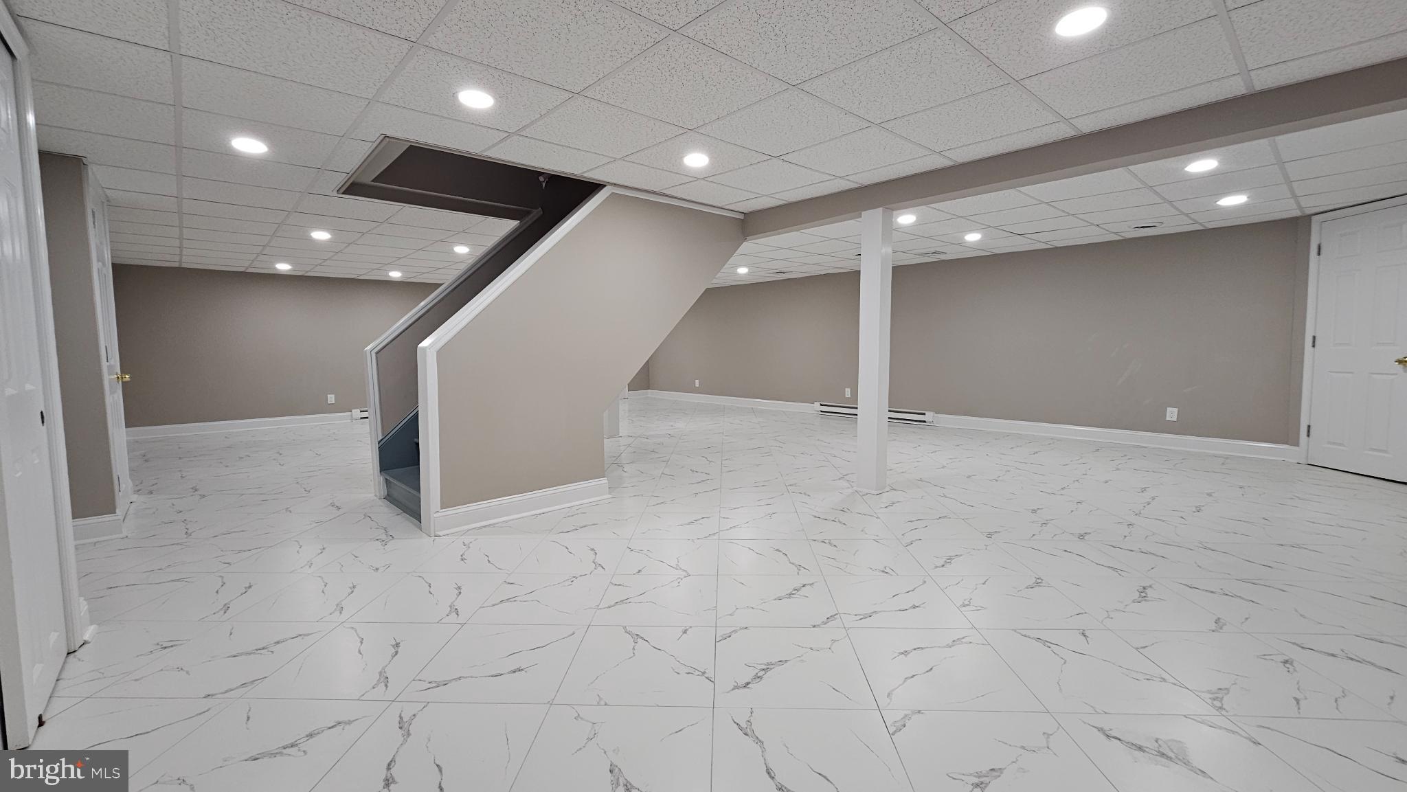 1217 McKean Road Ambler, PA 19002 - Photo 60 of 63 an empty room with wooden floor