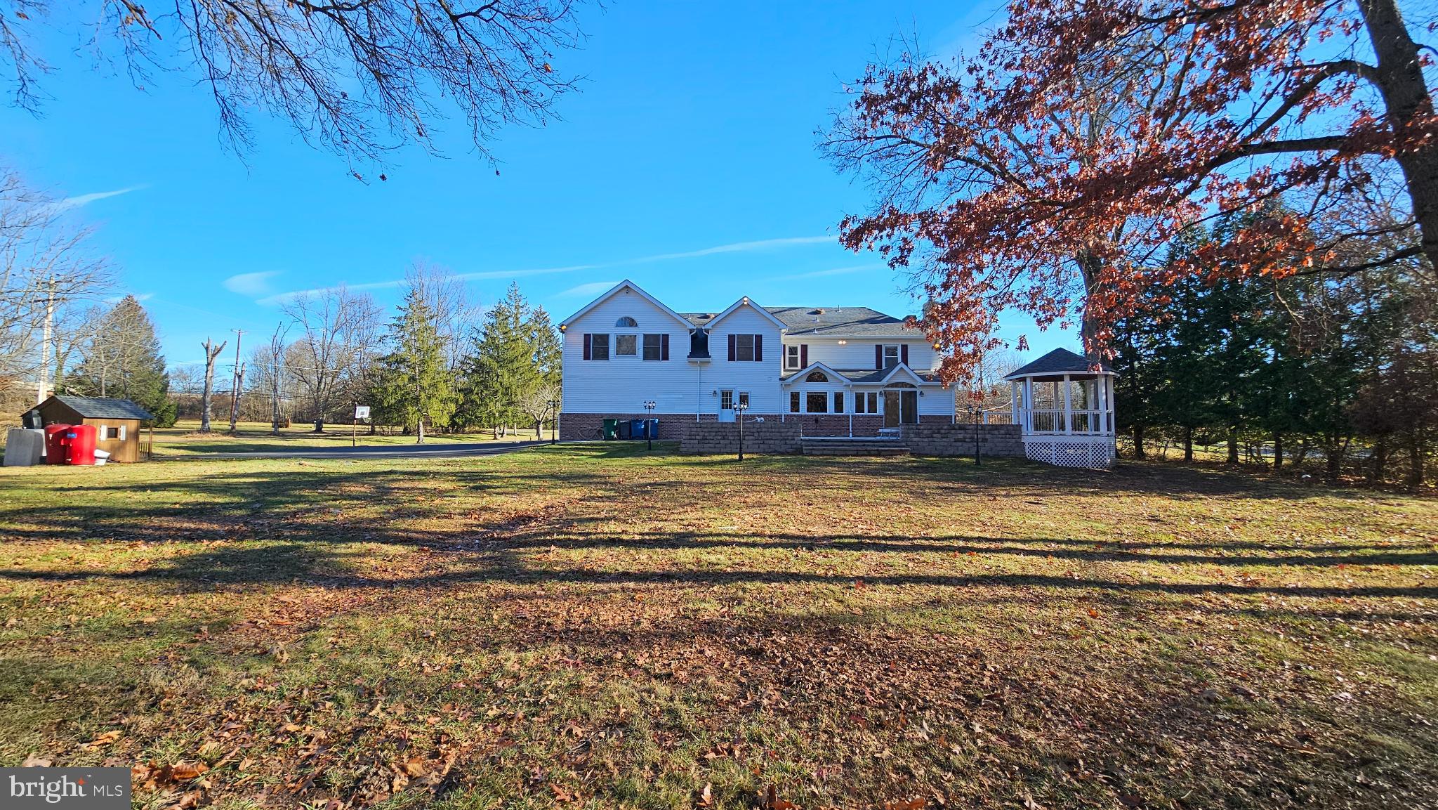 1217 McKean Road Ambler, PA 19002 - Photo 9 of 63 a view of a house with a big yard