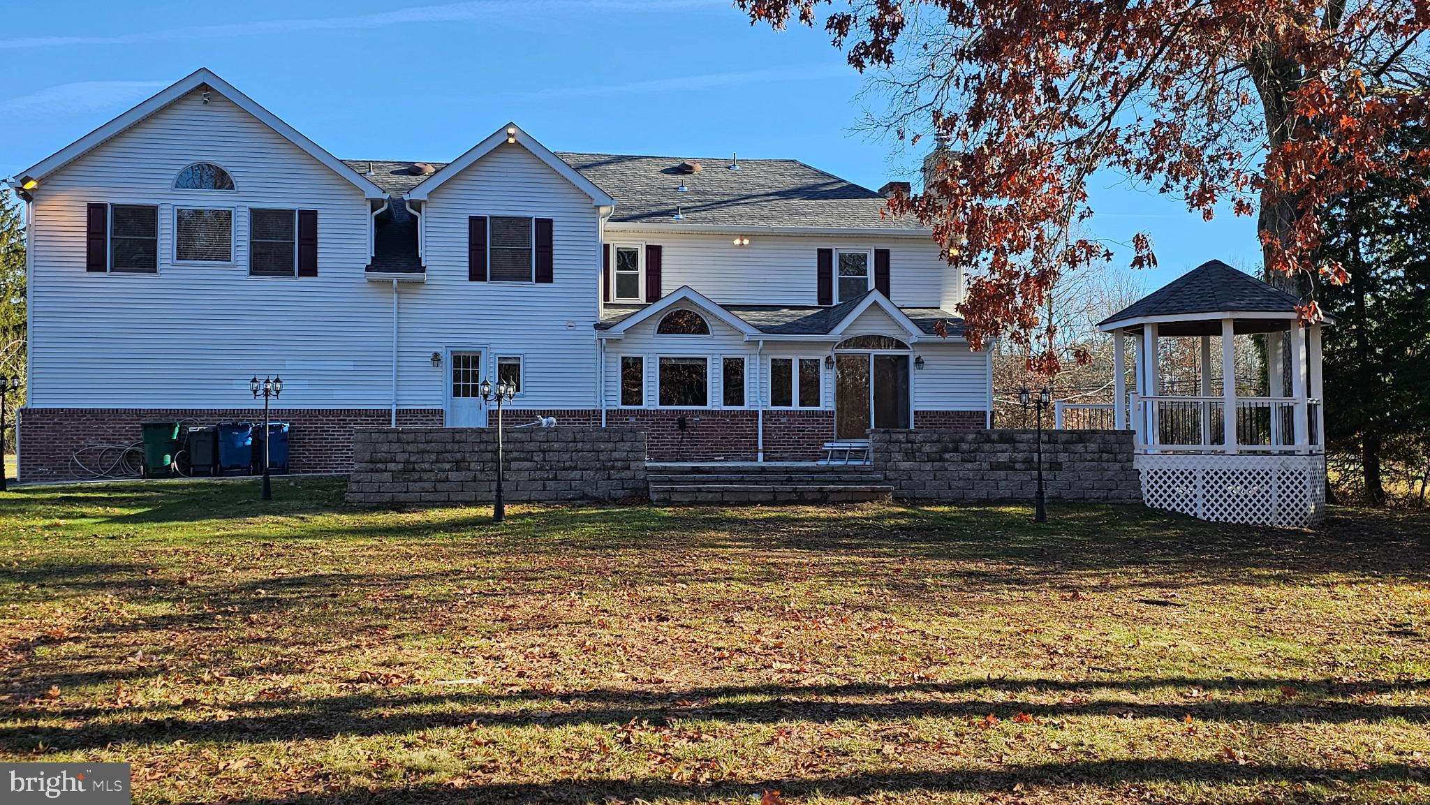 1217 McKean Road Ambler, PA 19002 - Photo 10 of 63 a view of a house with a swimming pool