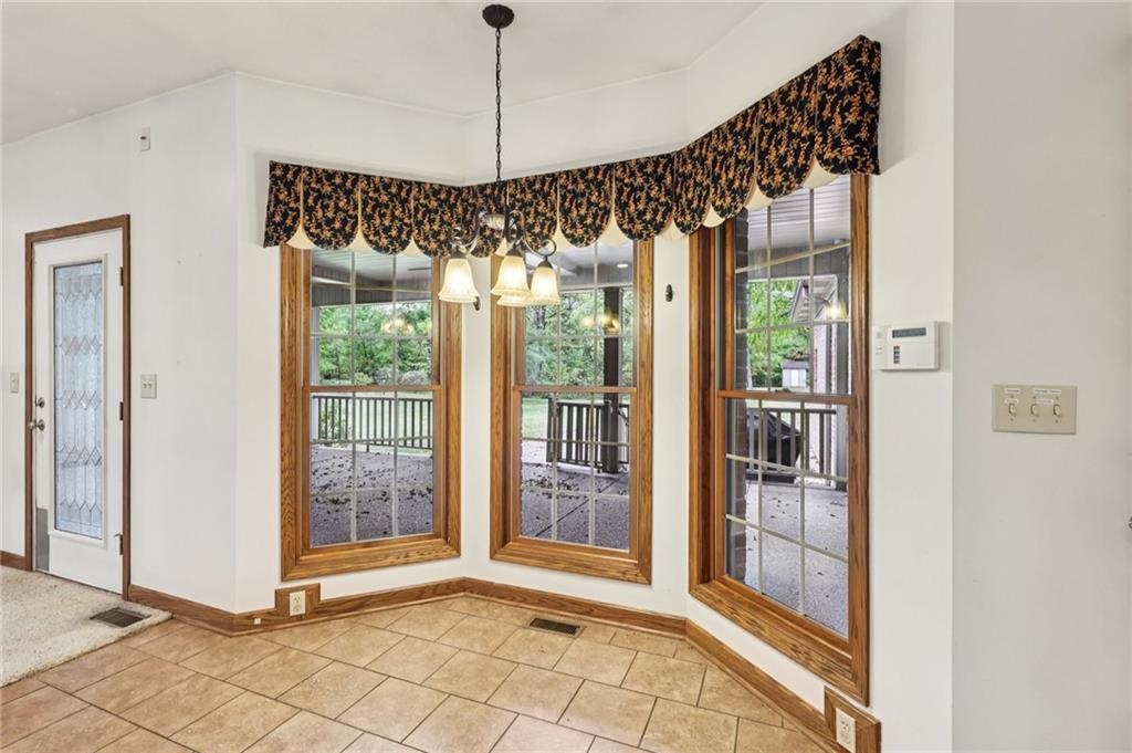 2210 Skyhill Road Edinburg, PA 16116 - Photo 11 of 49 a view of an empty room with glass door