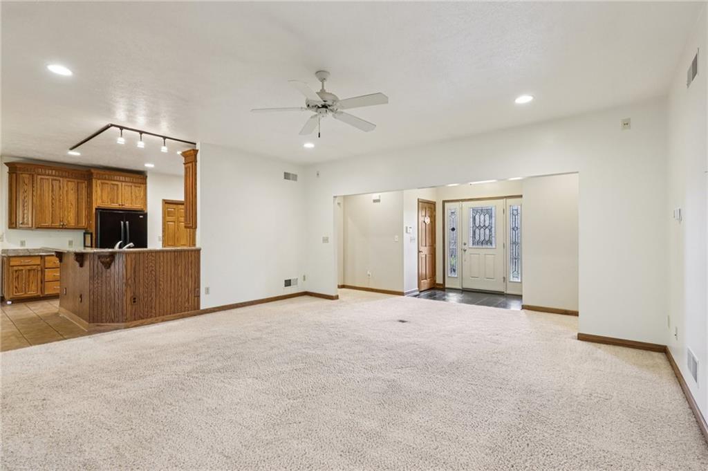 2210 Skyhill Road Edinburg, PA 16116 - Photo 14 of 49 a view of a kitchen with a sink and a refrigerator