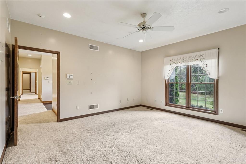 2210 Skyhill Road Edinburg, PA 16116 - Photo 19 of 49 a view of an empty room with a window