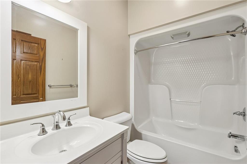 2210 Skyhill Road Edinburg, PA 16116 - Photo 27 of 49 a bathroom with a sink toilet and shower