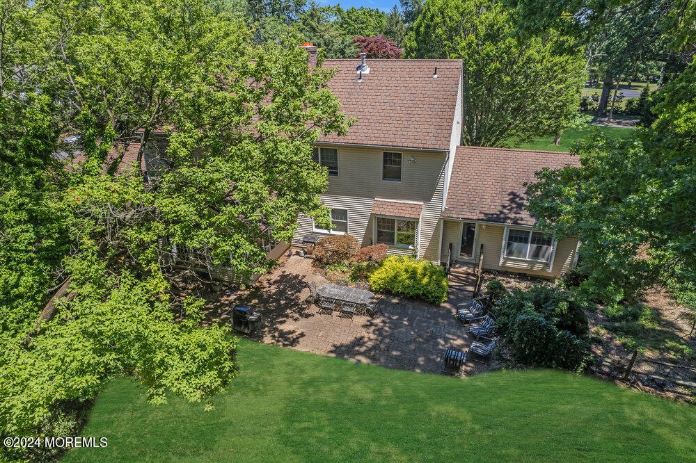 5 Clover Lane Rumson, NJ 07760 - Photo 11 of 12 a aerial view of a house with a yard and tree s